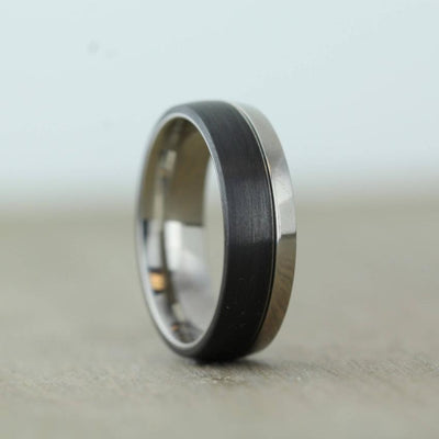  polished Titanium wedding ring band with black brushed carbon fibre. 7mm wide uk